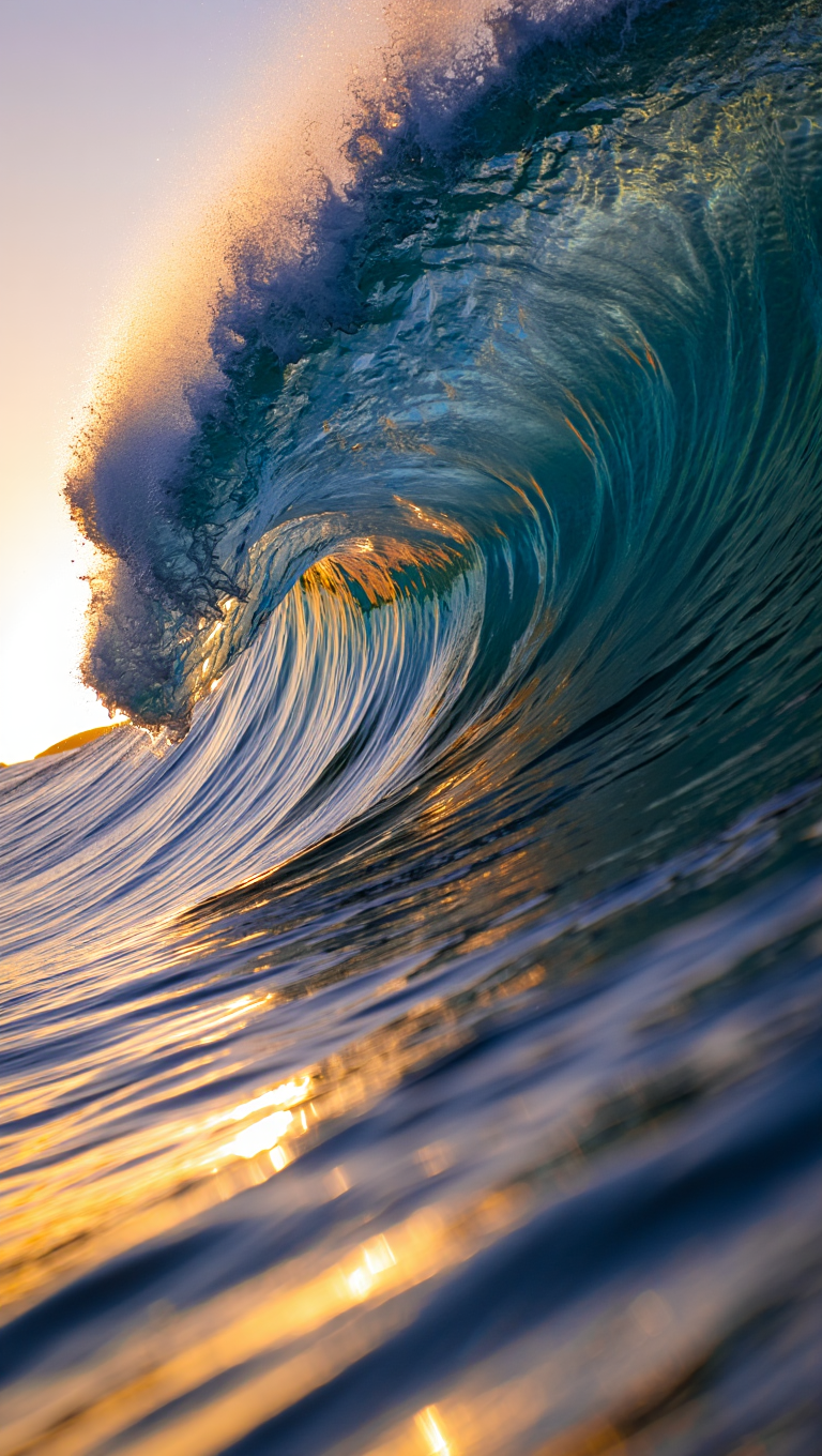 A close-up photography of a massive ocean wave
